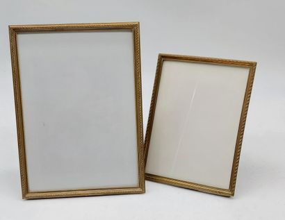 TWO PHOTO FRAMES in gilded brass
Louis XVI...