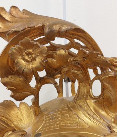 Gilt and chased bronze CARTEL D'APPLIQUE...