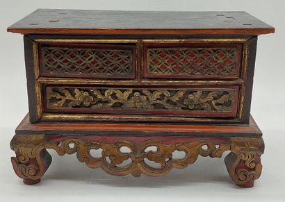 SMALL CABINET in gilded, carved and red lacquered...