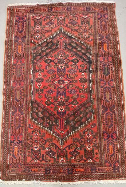 THREE HAND-MADE WOLF RUGS FROM THE EAST
-...