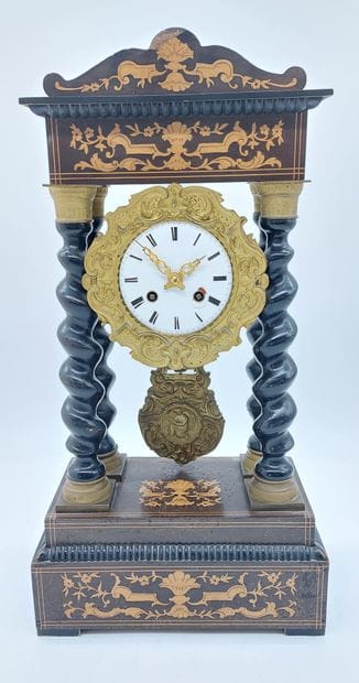 PENDULE in blackened wood decorated with...