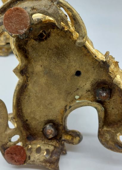 PAIRE DE BOUGEOIRS in chased and gilt bronze...