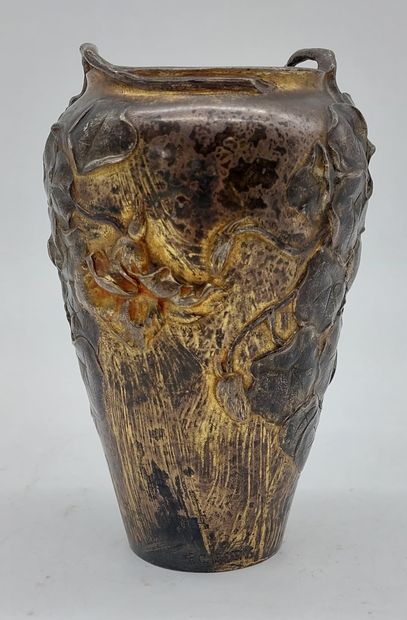 F. CLAESSENS
Bronze vase decorated with flowers...