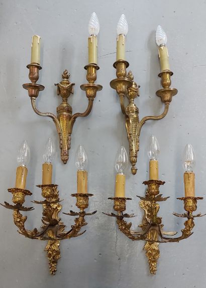 TWO PAIRS OF APPLIQUES in gilded and chased...