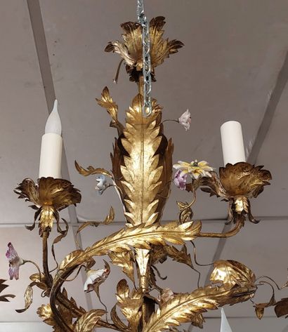 Gilded metal chandelier with porcelain flower...