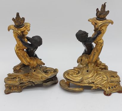 PAIRE DE BOUGEOIRS in chased and gilt bronze...