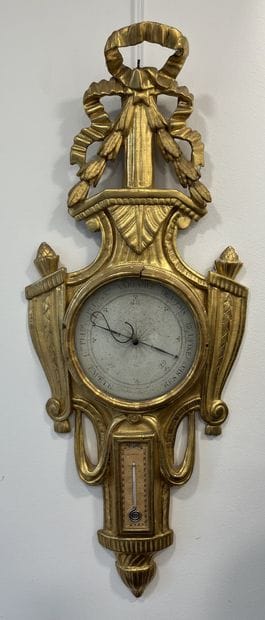 BAROMÈTRE-THERMOMÈTRE

en bois doré, mouluré...