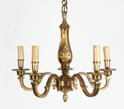 LOT DE QUATRE LUSTRES EN BRONZE ET LAITON

-	Lustre...