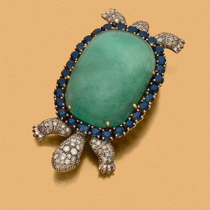 BROCHE 
présentant une tortue retenant en...