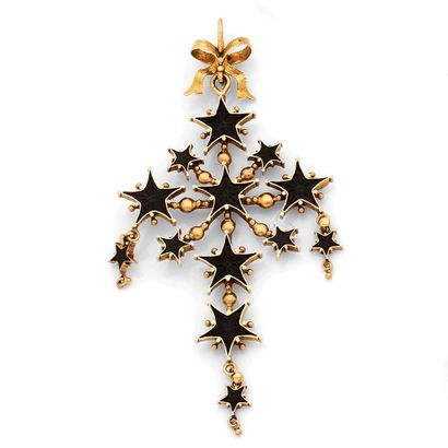 PENDENTIF 
orné d'une croix avec des étoiles...