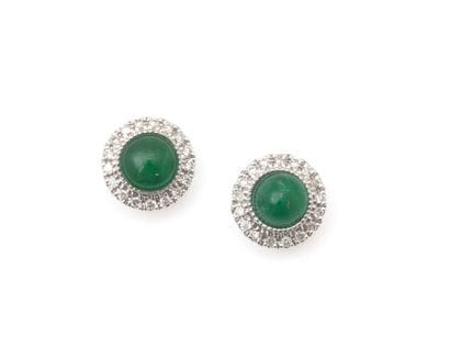 PAIRE DE PUCES D'OREILLES
retenant en leur...