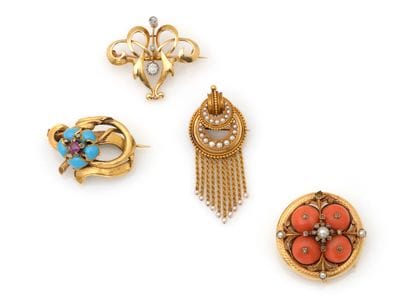 ENSEMBLE DE QUATRE BROCHES
1/ de forme circulaire...