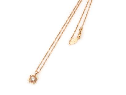 MAUBOUSSIN 
COLLIER 
présentant une fleur...