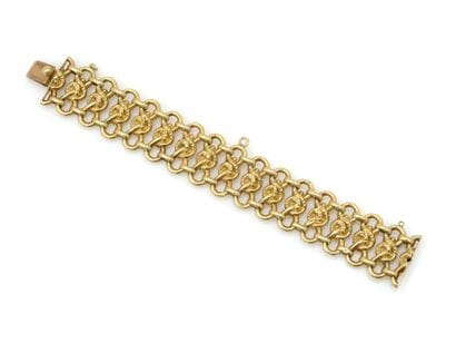 BRACELET 
retenant une maille géométrique...