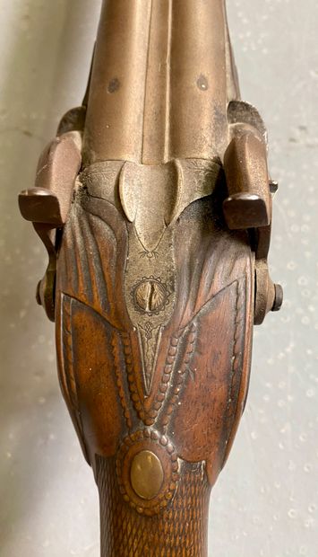 SILEX RIFLE with double barrels, carved wooden...