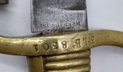 BRIQUET SABRE, bronze handle, leather scabbard

Numbered...