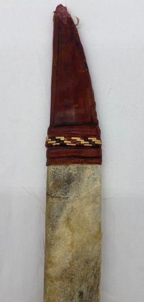 AFRICAN MACHINE in leather scabbard, leather-covered...