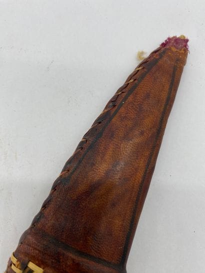 AFRICAN MACHINE in leather scabbard, leather-covered...