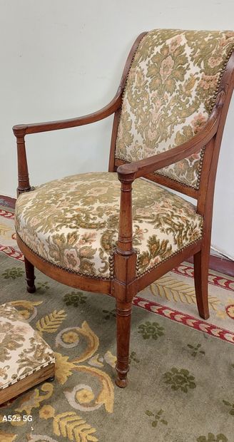 Natural wood armchair upholstered in floral...