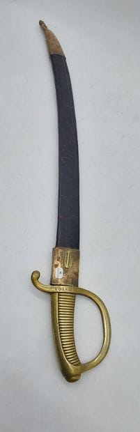 BRIQUET SABRE, bronze handle, leather scabbard

Numbered...