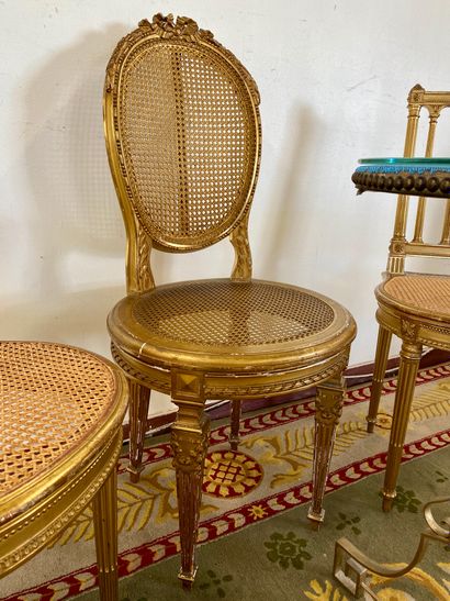 Pair of gilded wood chairs with barbed backs,...