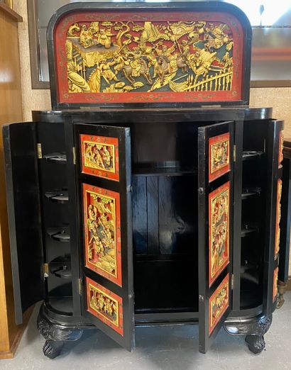 CHINA

Richly carved lacquered wood bar cabinet...