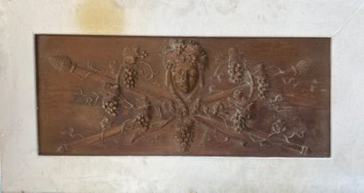 Carved wooden PANEL decorated with a figure's...