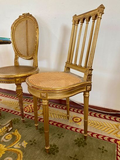 Pair of gilded wood chairs with barbed backs,...