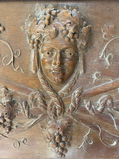 Carved wooden PANEL decorated with a figure's...