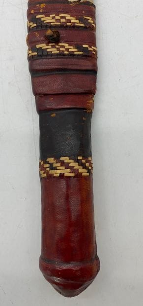 AFRICAN MACHINE in leather scabbard, leather-covered...