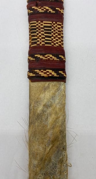 AFRICAN MACHINE in leather scabbard, leather-covered...