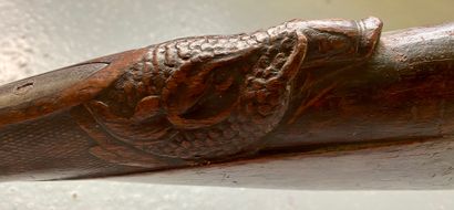 SILEX RIFLE with double barrels, carved wooden...