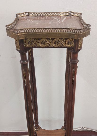 Mahogany veneered SELLETTE with gilded bronzes,...