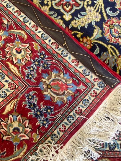 Handmade wool carpet with central medallion...
