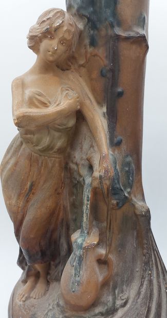 Pair of Art Nouveau plaster vases decorated...