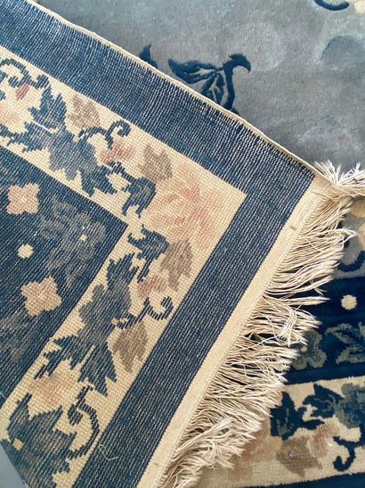 TWO RUGS

- handmade wool carpet with flower...