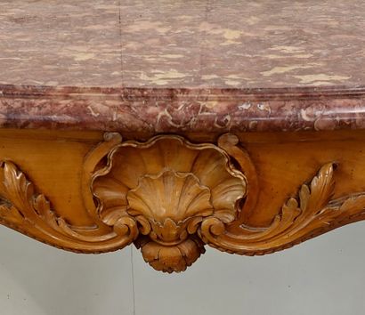 LARGE CONSOLE in molded and carved natural...