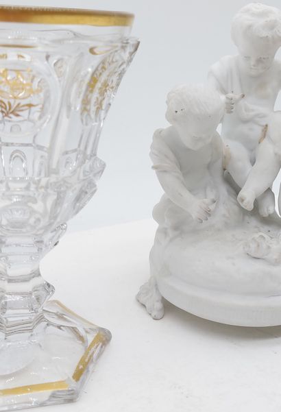 LOT including :

- 1 bisque group, three...