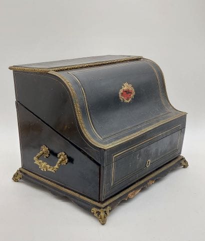 LIQUEUR CELLAR in blackened wood and brass...