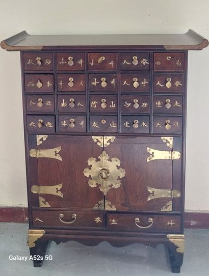 CHINA

Cabinet with two doors and 22 drawers,...