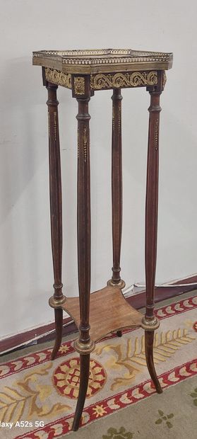 Mahogany veneered SELLETTE with gilded bronzes,...