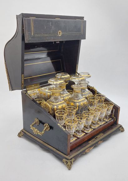 LIQUEUR CELLAR in blackened wood and brass...