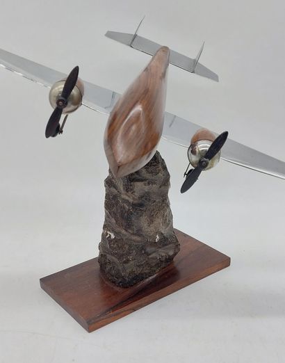 Aircraft model in wood and aluminum

Stone...