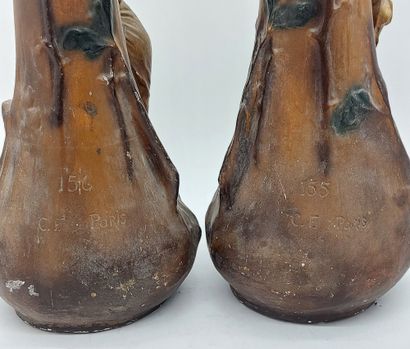 Pair of Art Nouveau plaster vases decorated...