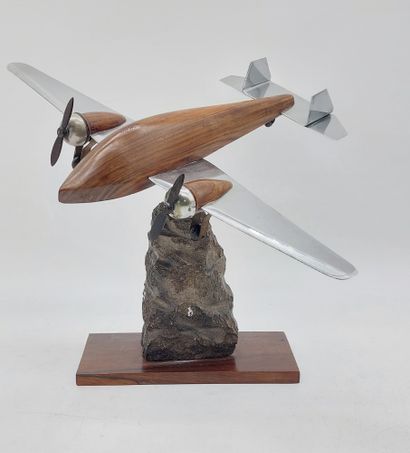 Aircraft model in wood and aluminum

Stone...