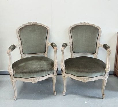 PAIR OF ARMCHAIRS in moulded and carved lacquered...