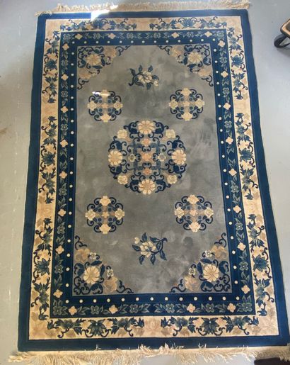 TWO RUGS

- handmade wool carpet with flower...