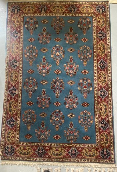 TWO RUGS

- handmade wool carpet with flower...
