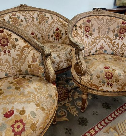 Gilded wood salon with floral fabric upholstery,...