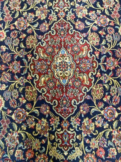 Handmade wool carpet with central medallion...